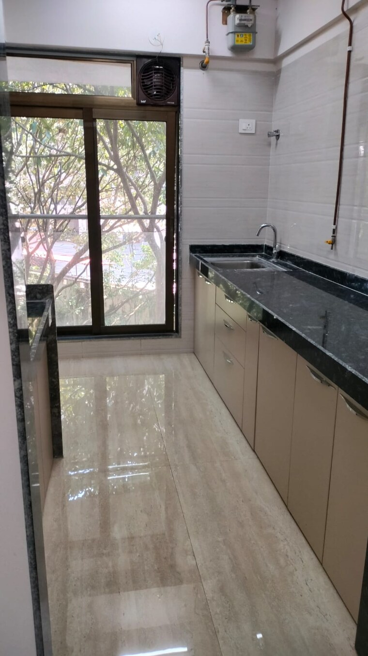 Kitchen, je-and-vee-om-trimurti 1 Bedroom 407 Sq.Ft. Apartment In Malad East Mumbai 9512424
