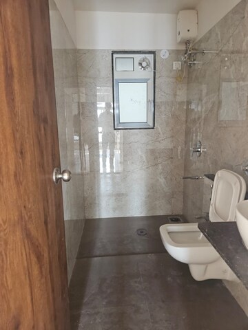Bathroom in 3 BHK Apartment at Kaveri Heritage, Borivali West – for Rent