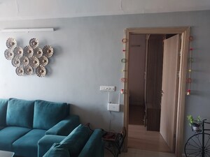 Living Room in 3.5 BHK Apartment at DLF New Town Heights III, Sector 91 – for Rent