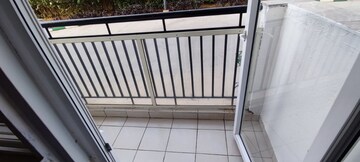 Balcony in 2 BHK Apartment at Prestige Tranquility, Budigere – for Rent