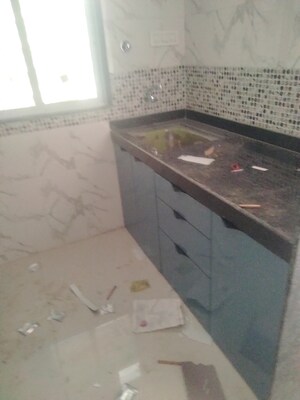 Kitchen in 1 BHK Apartment at DGS Sheetal Tapovan, Malad East – for Sale