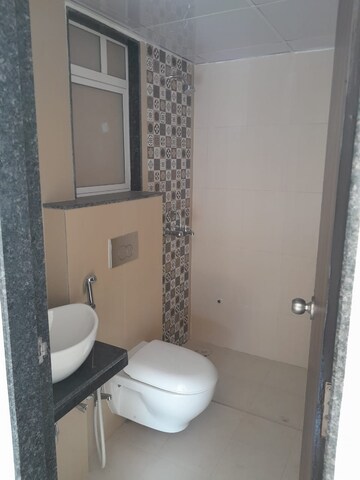 Bathroom in 4 BHK Apartment at SD Siennaa Wing D, Kandivali East – for Sale