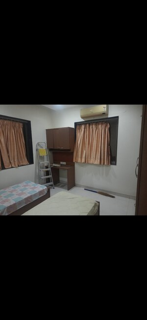 Bedroom in 2 BHK Apartment at Yashovardhan Society, Mahim – for Rent