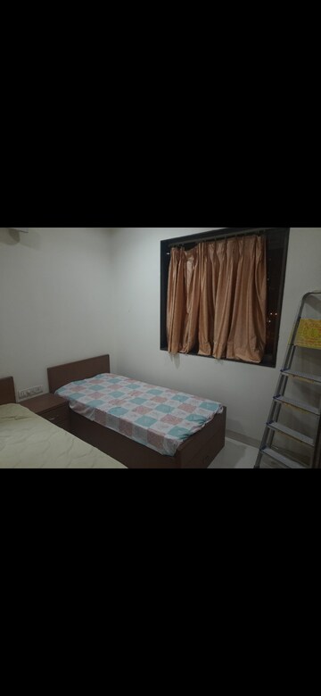 Bedroom in 2 BHK Apartment at Yashovardhan Society, Mahim – for Rent