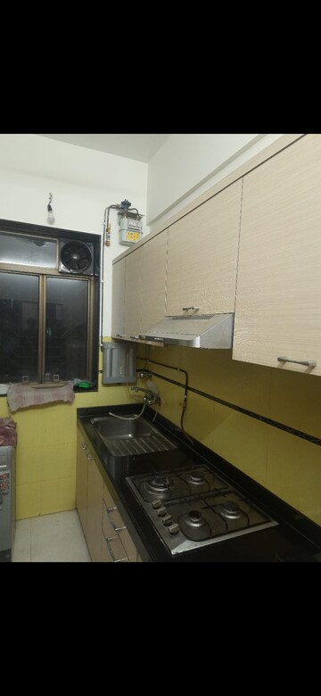 Kitchen in 2 BHK Apartment at Yashovardhan Society, Mahim – for Rent