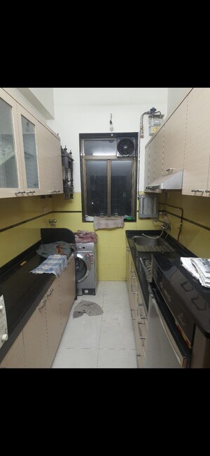 Kitchen in 2 BHK Apartment at Yashovardhan Society, Mahim – for Rent