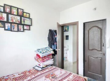 Bedroom in 2 BHK Apartment at Swastik Pride Homes, Rahatani – for Rent