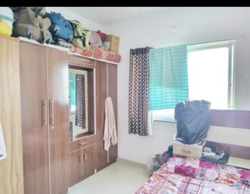 Bedroom in 2 BHK Apartment at Swastik Pride Homes, Rahatani – for Rent