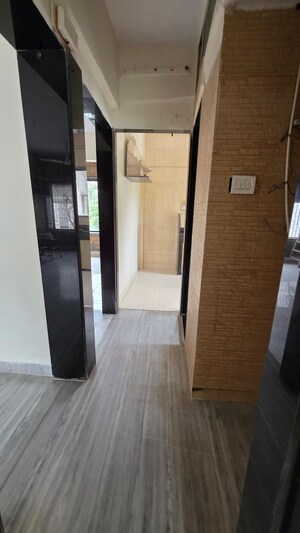 Building Lobby in 2 BHK Apartment at Four Bunglows – for Rent