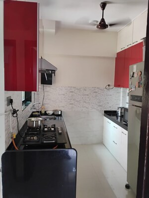 Kitchen in 2 BHK Apartment at Shree Satya Shankar Residency, Manpada – for Sale