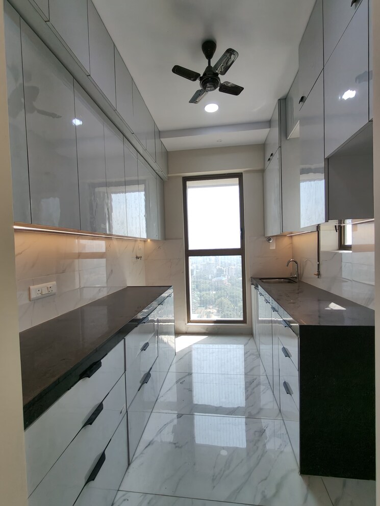 Kitchen, raymond-ten-x-habitat 2 Bedroom 644 Sq.Ft. Apartment In Pokhran Road No Two Thane 9513939