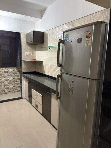 Kitchen in 2 BHK Apartment at Sudarshan Sky Garden Mumbai, Anand Nagar – for Sale