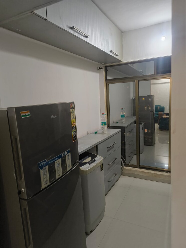 Kitchen, rehab-balaji-delta-tower-2 2 Bedroom 597 Sq.Ft. Apartment In Ulwe Navi Mumbai 9514233