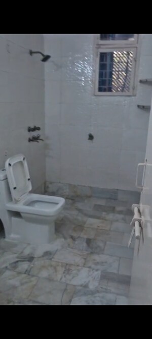 Bathroom in 3 BHK Apartment at Shipra Suncity, Vaibhav Khand – for Rent