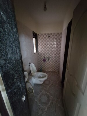 Bathroom in 2 BHK Apartment at Hyde Park Galaxy, Manpada – for Rent
