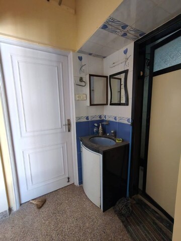 Bathroom in 2 BHK Apartment at Vrindavan ABC CHS, Malad East – for Rent