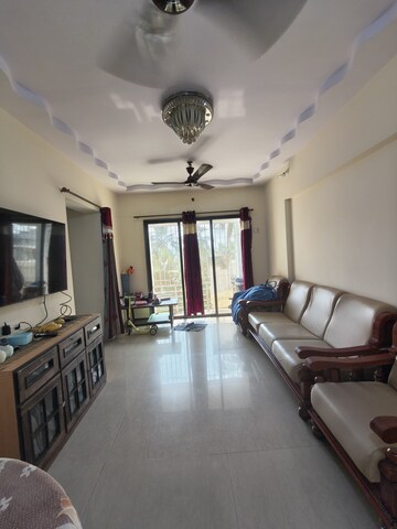 Living Room in 1 BHK Apartment at Monarch CHS, Andheri East – for Rent