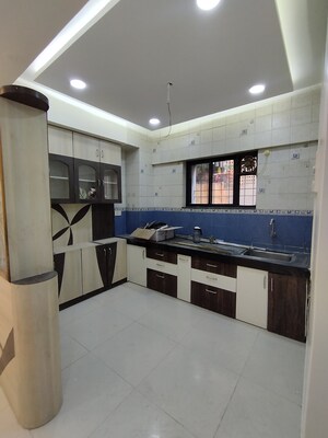 Kitchen in 2 BHK Apartment at Sai Milan, Pimple Gurav – for Rent