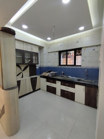 Kitchen in 2 BHK Apartment at Sai Milan, Pimple Gurav – for Rent