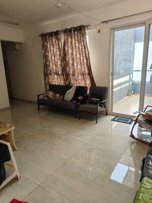 Living Room in 2 BHK Apartment at Mittal High Mont, Hinjewadi – for Rent