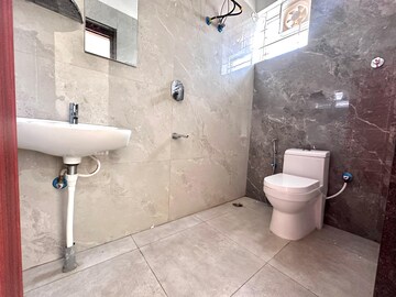 Bathroom in 2 BHK Apartment at Salarpuria Cambridge Residency, Cambridge Layout – for Rent