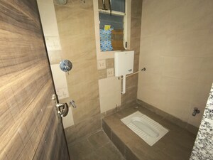 Bathroom in 2 BHK Apartment at Shreepad Savitri Audumbar, Dhayari – for Sale