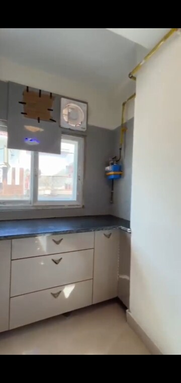 Kitchen in 4 BHK Builder Floor at Dwarka Mor – for Sale