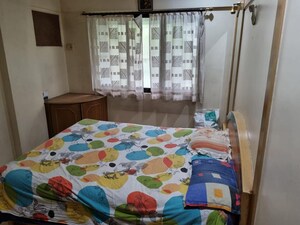 Bedroom in 3 BHK Apartment at Girnar Galaxy Apartment, Malad West – for Rent