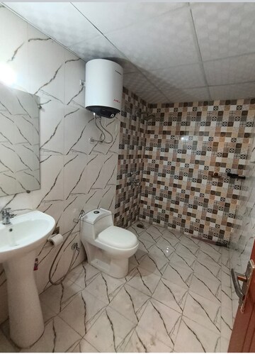 Bathroom in 3.5 BHK Apartment at Surya Aastha Greens, Sector 4 Greater Noida – for Rent