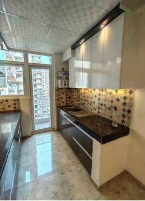 Kitchen in 3.5 BHK Apartment at Surya Aastha Greens, Sector 4 Greater Noida – for Rent