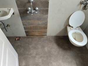 Bathroom in 1 BHK Apartment at Lodha Amara, Kolshet Road – for Rent