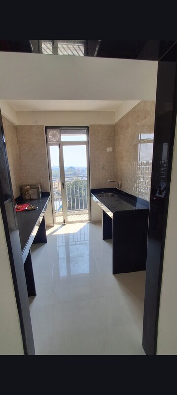 Kitchen in 2 BHK Apartment at Ajmera Crosstown One, Kalyan West – for Rent