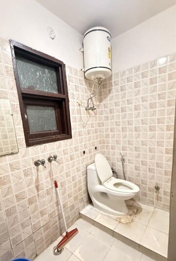 Bathroom in 1 BHK Builder Floor at Freedom Fighters Enclave – for Rent