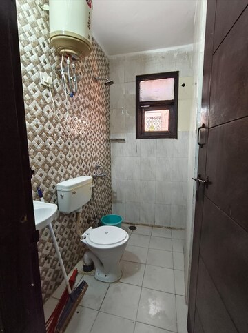 Bathroom in 1 BHK Builder Floor at Freedom Fighters Enclave – for Rent