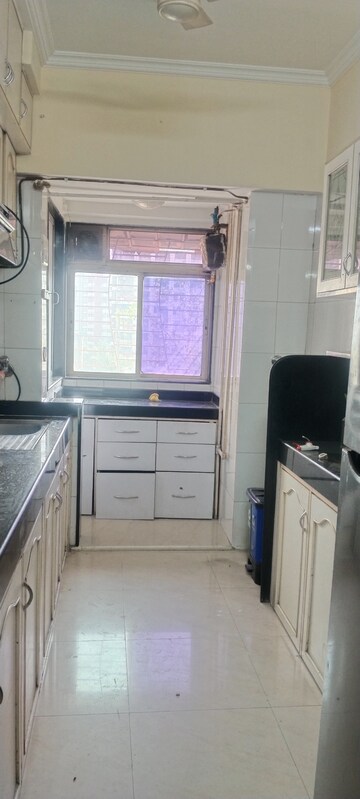 Kitchen in 3.5 BHK Apartment at Nirmal Lifestyle Residency CHS Ltd, Mulund West – for Rent
