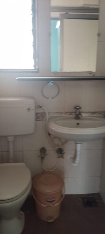 Bathroom in 2 BHK Apartment at Runwal Heights, Mulund West – for Rent