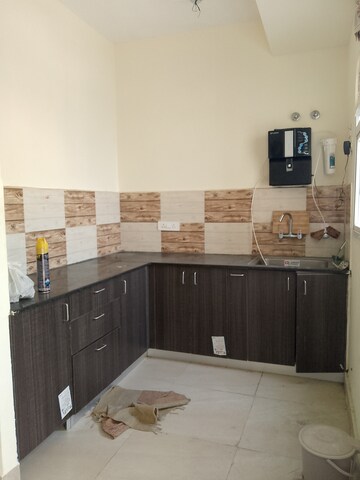 Kitchen in 3 BHK Apartment at Amrapali Enchante, Tech Zone 4 Greater Noida – for Rent