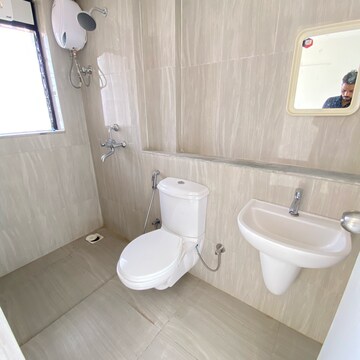 Bathroom in 1 BHK Apartment at Runwal Gardens Phase 2, Kalyan Shilphata Road – for Sale