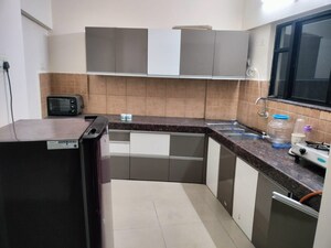 Kitchen in 2 BHK Apartment at Gera Emerald City, Kharadi – for Rent