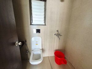 Bathroom in 1.5 BHK Apartment at Runwal My City, Dombivli East – for Rent