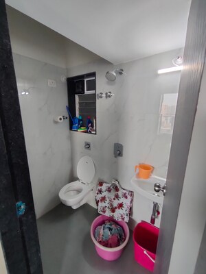 Bathroom in 1 BHK Apartment at Neelyog Aashiyana, Kandivali West – for Rent