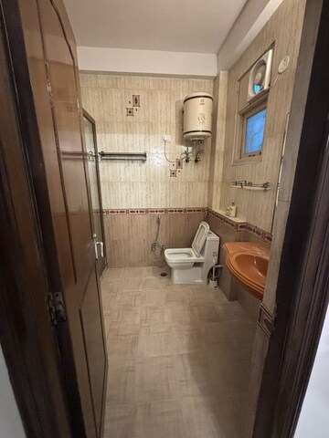 Attached Bathroom in 3 BHK Builder Floor at Freedom Fighters Enclave – for Rent