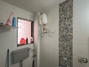 Bathroom in 1 BHK Apartment at Shah Arcade, Kharghar – for Rent