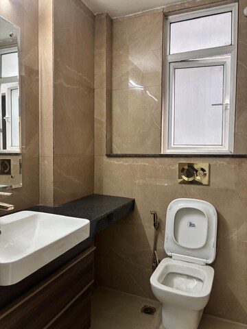 Bathroom in 3 BHK Builder Floor at Smart World Orchard, Sector 61 – for Rent