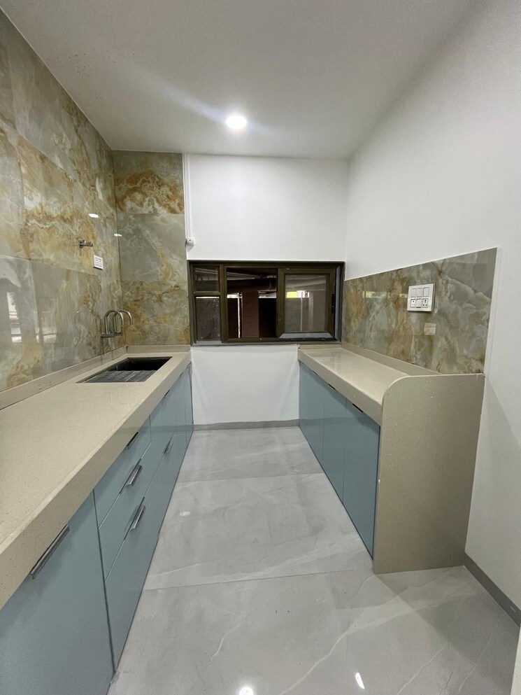 Kitchen, oxy-beaumonde 2 Bedroom 904 Sq.Ft. Apartment In Viman Nagar Pune 9516227