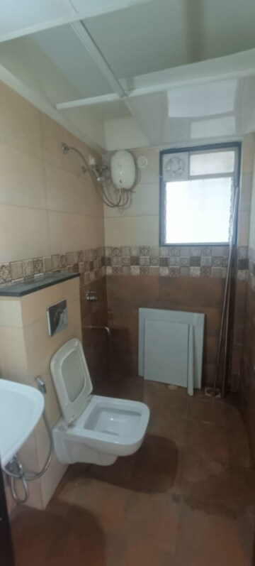 Bathroom in 3 BHK Apartment at Wakad – for Rent