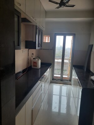 Kitchen in 2 BHK Apartment at Siddhi Highland Haven, Balkum Pada – for Rent