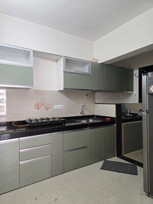 Kitchen in 1 BHK Apartment at Kohinoor Viva City, Dhanori – for Rent