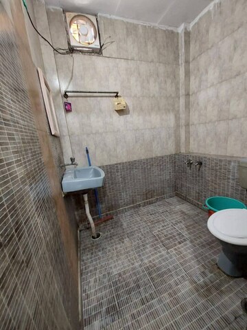 Bathroom in 1 RK Builder Floor at Chattarpur – for Rent