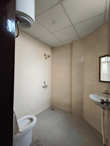 Bathroom in 3 BHK Apartment at Parsvnath Green Ville, Sector 48 – for Sale